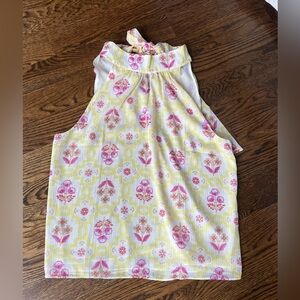 Ann Taylor sleeveless halter top. Button and tie back adds interest